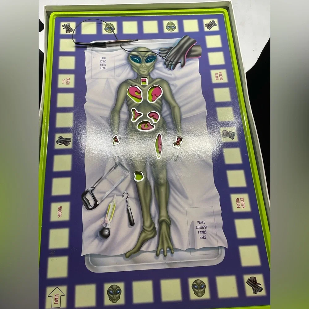 1997 DaMert Company Alien Autopsy Board Game. Game is missing one body piece.